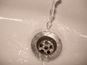 A drain guard can prevent items from falling down the drain.