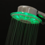 LED shower head on the black background