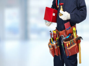 plumber with extensive tool belt