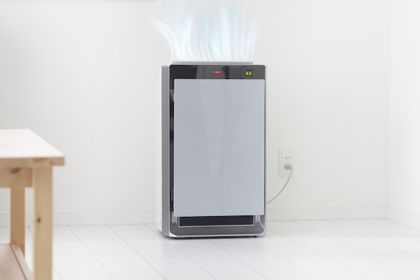 Air cleaning machine operating, with animated clean air rising out of the top.