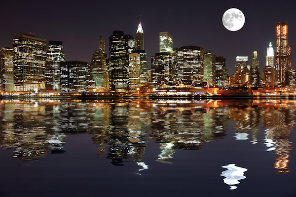 Shot of New York skyline at night as seen from the Hudson river. Featuring Cosmo's Moon.