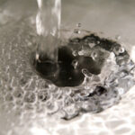 water draining out of faucet