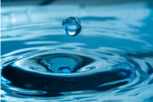 How does a water drip make that "plinking" sound?