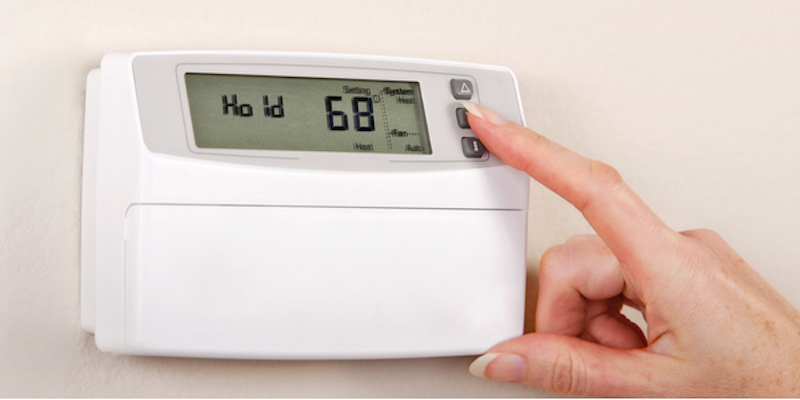 Hand adjusting thermostat