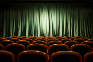 A dark movie theater interior.