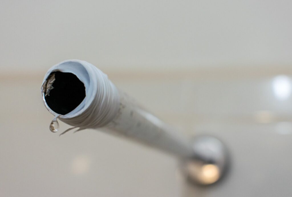 A shower arm with Teflon tape wrapped around it. Ready for new showerhead.